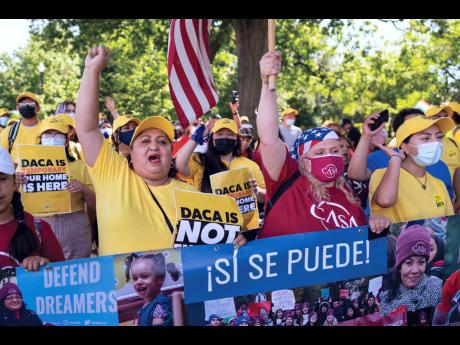 Ingrid Vaca (left), a native of Bolivia, helps to energise activists to rally in support of the Deferred Action for Childhood Arrivals programme, also known as DACA, at the Capitol in Washington on June 15. The Biden administration has unveiled a regulatio