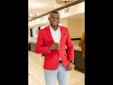  Jamar Wright, an entrepreneur at Mind Food International Ltd shared a smile with our lens before his presentation on purpose and leadership at the Johnnie Walker sponsored Men-Tell Workshop at The Jamaica Pegasus hotel.