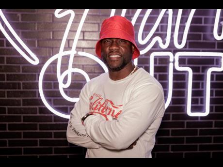Kevin Hart poses for a portrait at the opening of his new vegan fast-food restaurant, Hart House.