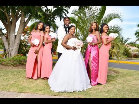 Brianna and Romane (centre) are joined by their beautiful bridesmaids.