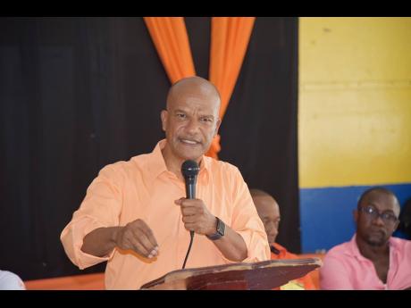 Senator Peter bunting addressing the annual regional executive council meeting of Region Five of the People’s National Party (PNP) at the Brompton Primary School in St Elizabeth on Sunday.