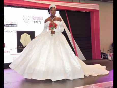 This wedding dress, fit for a queen, was courtesy of LuxBridesJA, and displayed during the fashion segment of the proceedings. 