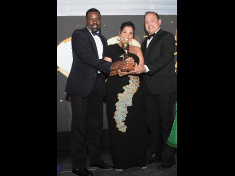 Margaritaville Caribbean copped the award for Caribbean’s Leading Entertainment Venue at the 29th Annual World Travel Awards at Sandals Montego Bay on Wednesday night. On hand accepting the trophy (from left) are Adrian Harrison, group sales manager, Mar