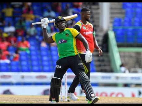 
Romario Shepherd (right) of Guyana Amazon Warriors looks disappointed as Rovman Powell of the Jamaica Tallawahs celebrates winning the Men’s Hero Caribbean Premier League match four at Warner Park Sporting Complex in Basseterre, St Kitts and Nevis, yest