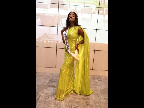 Miss International Jamaica Israel Harrison glistened in a yellow sequinned gown.