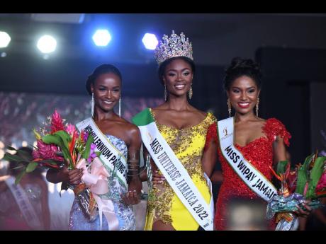 Miss Universe Jamaica 2022 Toshami Calvin (centre) is flanked by Miss Millennium Paving Stones Ltd Rachel Silvera, first runner-up and Miss WiPay Jamaica Shanique Singh, second runner-up.