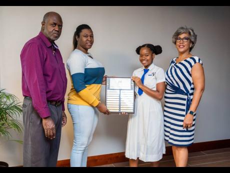 (From left) Howard and Michelle Gordon father and sister to late ICHS students Kimberley and Jhenaè, with Grade 11 ICHS student Hannah Hepburn, and Kim Mair, president of the ICHS Alumnae Association.