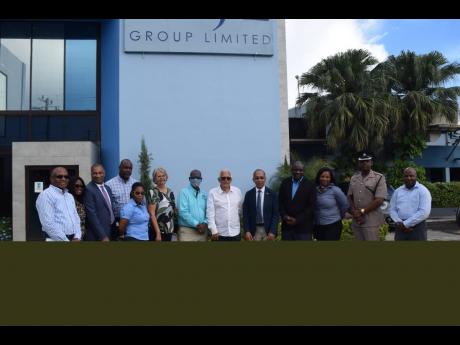 Representatives of the Shipping Association of Jamaica with the ministerial delegation following the tour of the Newport West community.