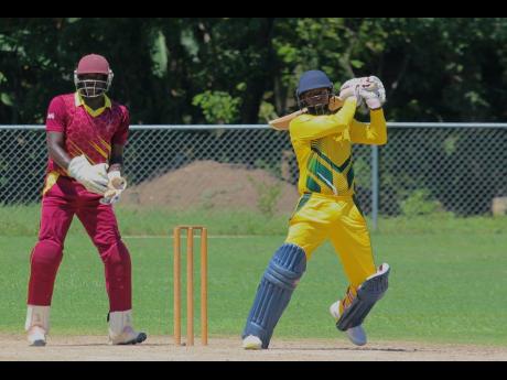 Clarendon Cricket Association batsman Albert Gopie scores through the off side on his way to an unbeaten 40 against St Catherine Cricket Association in their JCA T20 Bashment encounter at Sir P Oval in Clarendon on Sunday.