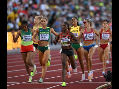 Jamaica’s Adelle Tracey (third right) tracks the field led by Kenyan Faith Kipyegon (centre) during the women’s 1500m at the World Championships in Eugene, Oregon.