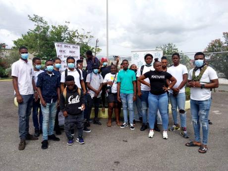 The cohort takes a group shot on the grounds of the Trench Town Polytechnic College, after their orientation for the BCIC YUTE WORK Project on September 1. 