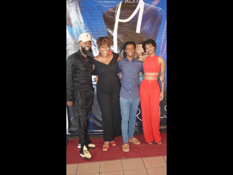 From left: Fashion designer Troy Oraine joins ‘Raw Materials’ cast members Sherando Ferril, Sekai Smart-McCaulay and Quera South on the red carpet. 
