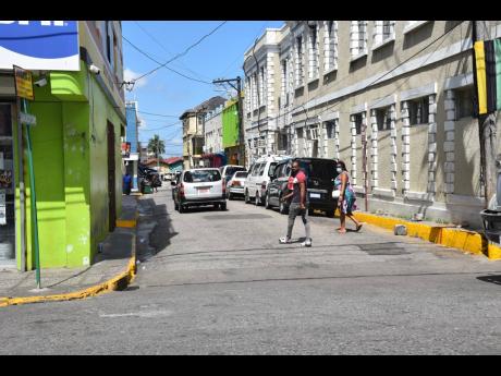
These clear sidewalks in the town of Montego Bay are normally congested with vendors and hustlers, forcing pedestrians to walk in the road.