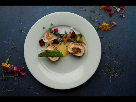 Rishi Ramoutar prepared stuffed chicken breasts, served with grilled vegetables.