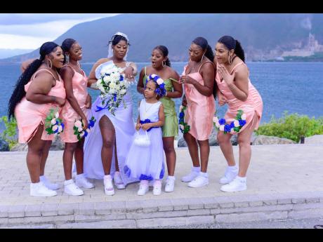 The bride and bridesmaids also showed support for the wedding’s sneakers theme.