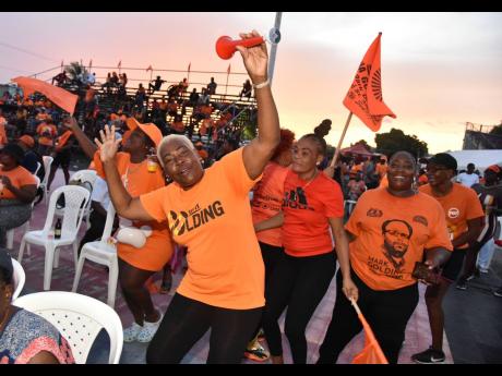 People’s National Party supporters gather at the Tony Spaulding Sports Complex in Arnett Gardens at the party’s St Andrew Southern constituency conference on Sunday.