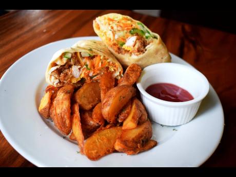 The diverse menu also includes chicken wraps served with wedges. 