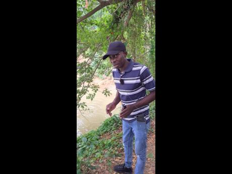 Noel Titus who retrieved the body of the newborn in the Rio Cobre on Thursday.