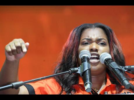 Gabriela Morris, president of the PNPYO, delivers a rousing address to Comrades at the PNP’s 84th annual conference at the National Arena in Kingston on Sunday. 