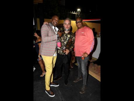 Retired cricketer Franklyn Rose (left) was all smiles as he shared lens time with Mr SE Haircare, a business partner of Chris Gayle, and entertainment industry heavyweight Junior ‘Heavy D’ Fraser.