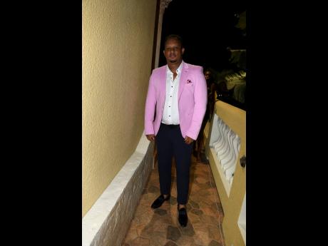 Dapper in a lavender jacket was Olympic and World Championship medalist Michael Frater.