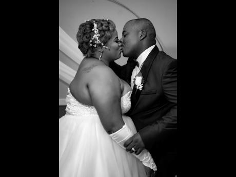 The couple celebrated their 19th anniversary together this year in holy matrimony, sealing their vows with a kiss.
