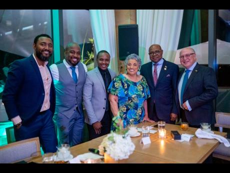 A fun launch was had by all. From left: Cedric Gidarsingh, beverage division manager; Jacques Scott; Mark Telfer, brand manager, Appleton Estate Jamaica Rum; Kamal Powell, regional marketing manager, Appleton Estate Jamaica Rum; Dr Joy Spence, master blend