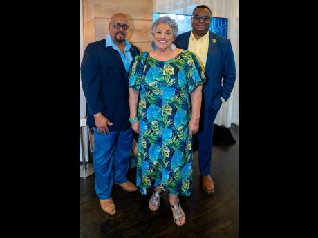 Christopher Saunders (left), deputy premier and minister for finance and economic development, Cayman Islands, and Bernie Bush, minister for youth, sports, culture and heritage paused for a quick photo with Dr Joy Spence (centre), master blender Appleton E