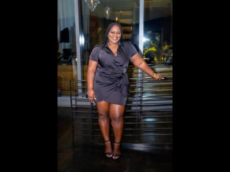 Candiese Leveridge, public relations and digital manager, J.  Wray & Nephew Ltd, hit the right notes in a little black wrap dress.