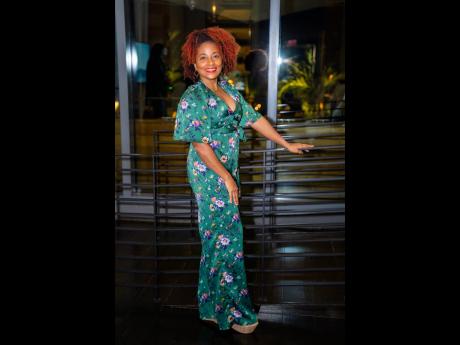 Samara South, public affairs and government relations specialist, J. Wray & Nephew Ltd, struck a pose for the camera wearing a chic floral romper. 