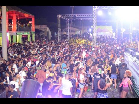Patrons fill the Kingston waterfront Soca+ venue during Night One of the music festival held on Friday. 