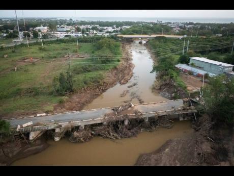View of a damaged bridge after Hurricane Fiona hit Villa Esperanza in Salinas, Puerto Rico, Wednesday, September 21, 2022.