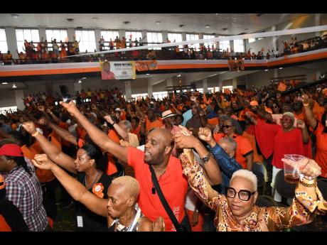 Comrades at last week’s staging of the PNP’s 84th annual conference at the National Arena in Kingston.