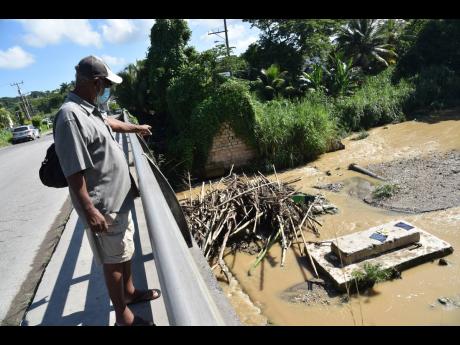 
Senior resident Henrick Neville says the failure of the NWA to remove the debris from the Montego River after five months could spell danger for the community of West Green in Montego Bay, St James.
