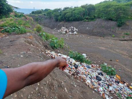 On Friday, while the channel of Chalky River appeared properly cleared for the torrents, garbage was observed heaped along the banks and at sections of the Rae Town fishing beach a few miles away from Weise Road in Bull Bay, St Andrew.