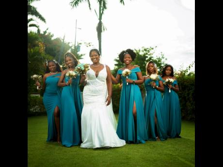 The bride and her bridal party glowed in their Chenele Wallace-designed dresses, enhanced by the afternoon sunshine. Bride Venetia Shepherd (third left) is flanked (from left) by: Melissa Bryan, maid of honour and bridesmaids Delani Campbell, Risanne Cooke