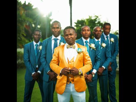 Standing out in gold, the groom, Adrian Thomas (third left), was styled like a king on his wedding day, and is surrounded by his childhood friends (from left), Ikeyman Wilson; Best Man Calvin Morgan; Adrian Hewitt; Greg Dimitrius, and Winston McKenzie,who 