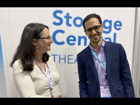 Senior international trade specialist in the US Department of Commerce, Cora Dickson, and head of market intelligence and public affairs at Qcells North America, Scott Moskowitz, at the RE+ renewable energy event held September 19-22, 2022 in Anaheim, Cali