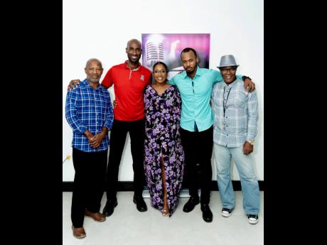 Sam Wisdom (left) is joined by Restaurants of Jamaica Brand Manager, Andrei Roper;  Basillia Barnaby-Cuff, founder and director of the Sterling Gospel Music Awards;  Brian Cuff, co-founder and producer; and  Patrick Kitson, at the recent Sterling Gospel Mu