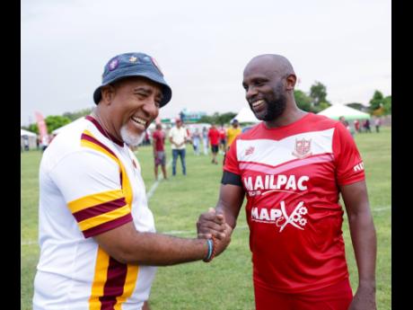 “It’s all good!” said Wolmerian Stephen McMorris (left), Director, MSR Design Studio to Campionite Christopher “CJ” James, CEO of DOS 2009 Limited, following the exciting face-off.