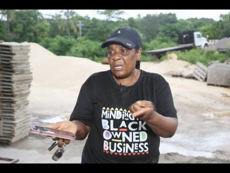 Winsome Palmer of LAP Blocks says that the Woods flood on Friday caused a breakaway at her property, resulting in the loss of half a million dollars worth of concrete blocks that were swept away.