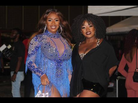 Media personality and recording artiste Press Kay (left) and Day Time Live host and dancer Neisha-Yen Jones were more than happy to grab this photo op. 