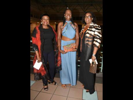 Unity in strength. From left: powerhouses Minna Israel, Chorvelle Johnson Cunningham and Marcia Erskine pause for a photograph before heading into the movie theatre.