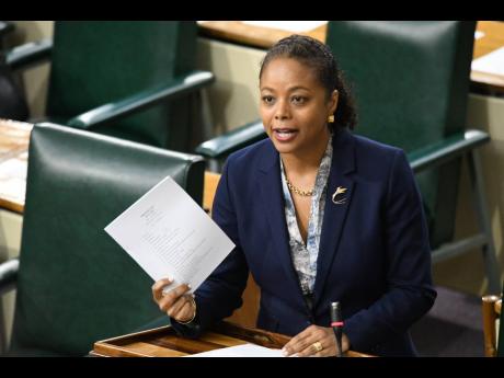 Minister of Legal and Constitutional Affairs Marlene Malahoo Forte addresses lawmakers about the much-anticipated Bail Act which was tabled in Parliament on Wednesday. 