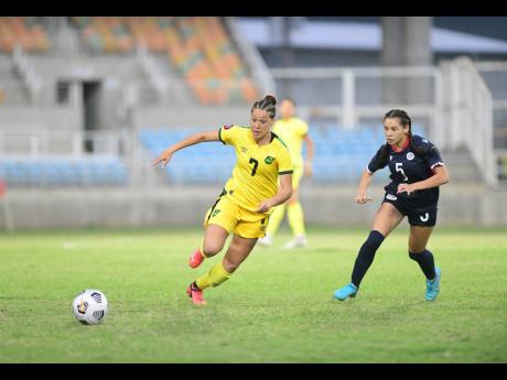 Chinyelu Asher (left) in action for the Reggae Girlz during a Concacaf Women’s World Cup qualifying match against the Dominican Republic. The match was played  at Sabina Park on April 12, 2022.