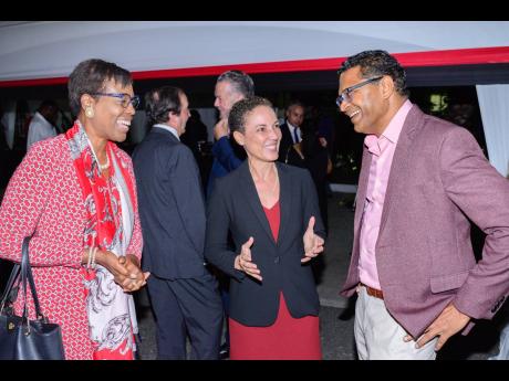 From left: Ambassador Sheila Sealy Monteith, permanent secretary, Ministry of Foreign Affairs and Foreign Trade; Kamina Johnson Smith, minister of foreign affairs and foreign trade; and Richard Pandohie, chief executive officer, Seprod Ltd.