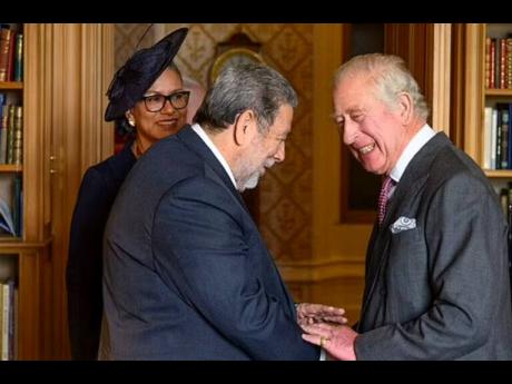 Prime Minister Dr Ralph Gonsalves meets with King Charles III in Scotland last Saturday. Accompanying him was his wife, Eloise (left).