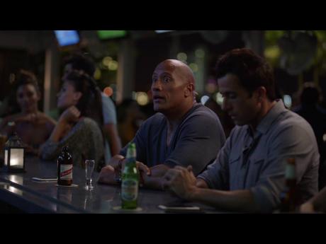 In Season 2 of ‘Ballers’, an American comedy-drama series, Dwayne ‘The Rock’ Johnson, unwinds with a Red Stripe beer. 