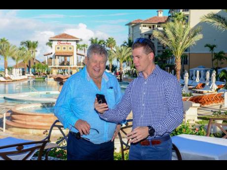 Adam shares a moment with his father, the late Gordon ‘Butch’ Stewart