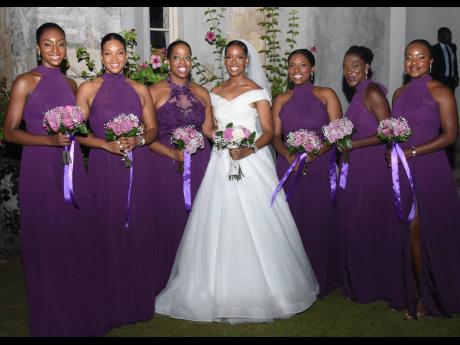 Bride Dana-Marie Dick is flanked by her bridesmaids (from left) Kelsey Ann Beckford, Candice Carby, Dr Deon Wilks, Joy Wint, Ruth Akinwale and Melissa Townsend.